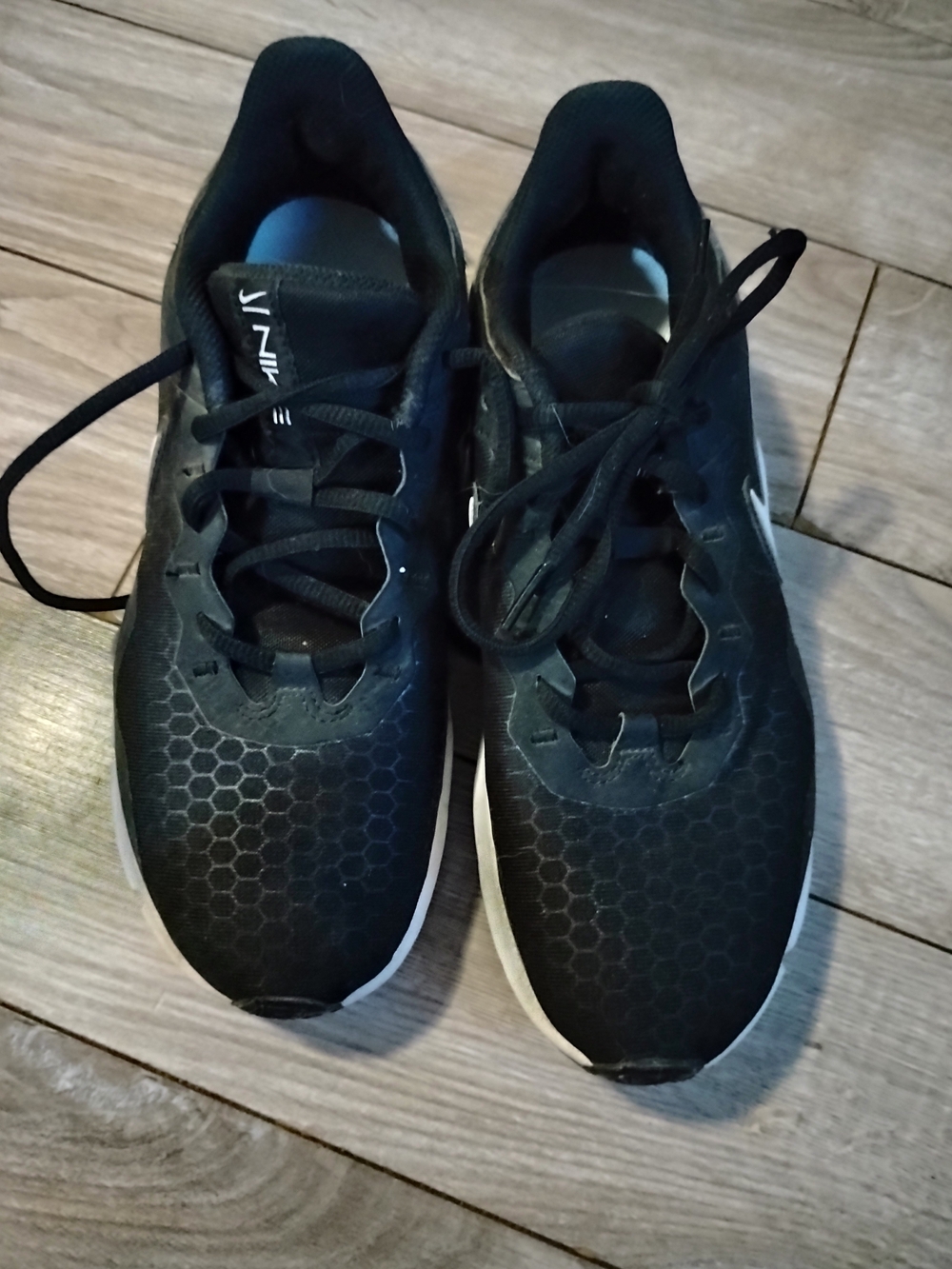 Nike Women's Black Athletic Running Shoes with White Sole